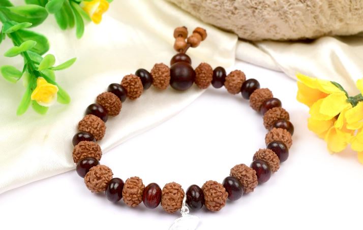 7 mukhi Mahalaxmi bracelet from Java with Red Sandalwood beads